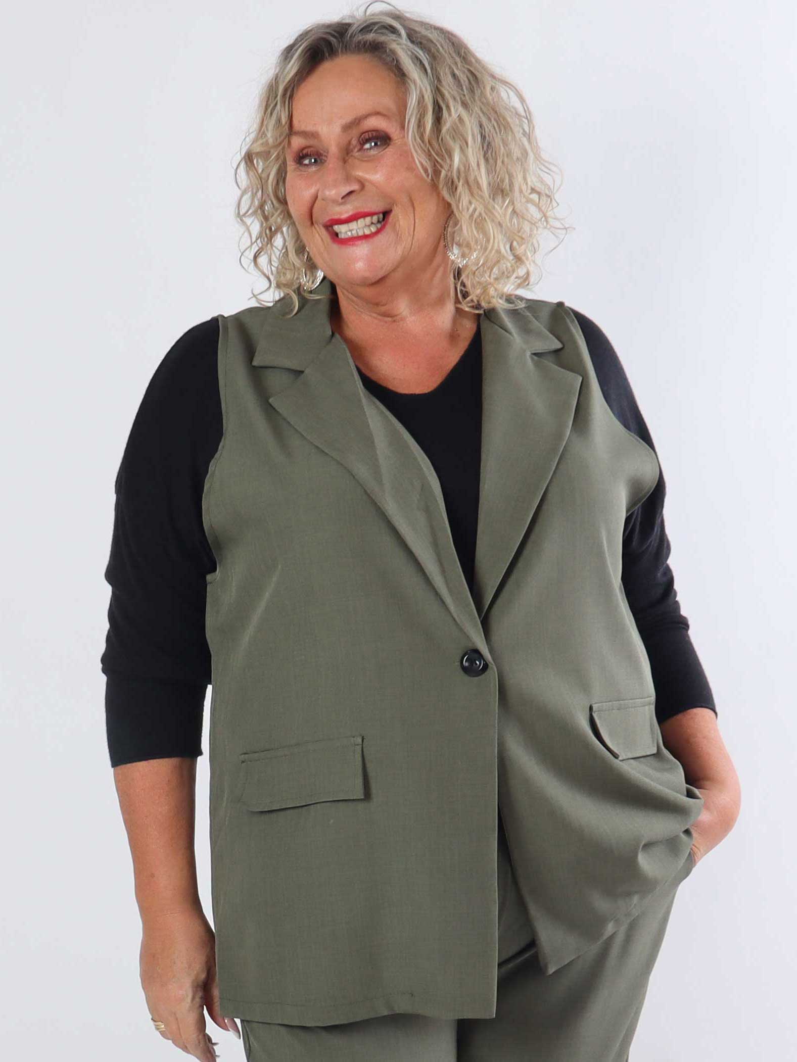 Shadia Vest - Enfärgad kostymväst med knapp och